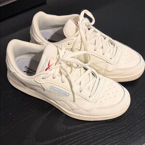 Reebok Off-White Sneakers with Blue Logo